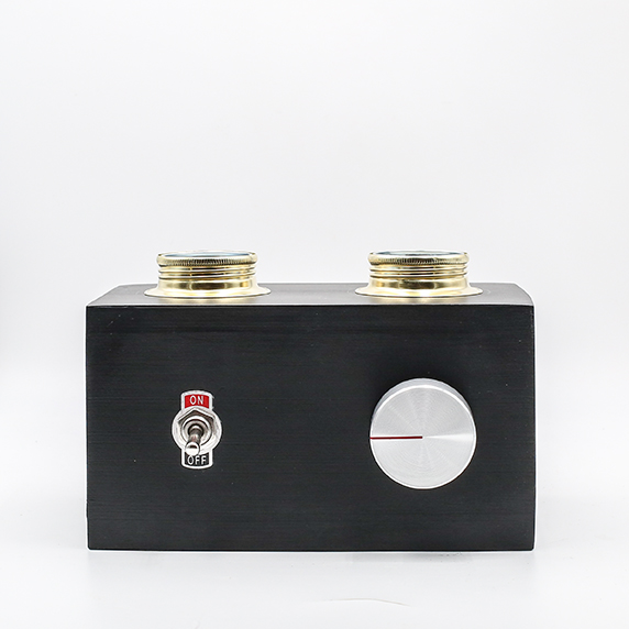 RADIO LAMP BLACK No.2 made with porcelaine clay, two bulbs and a silver dimming button.
