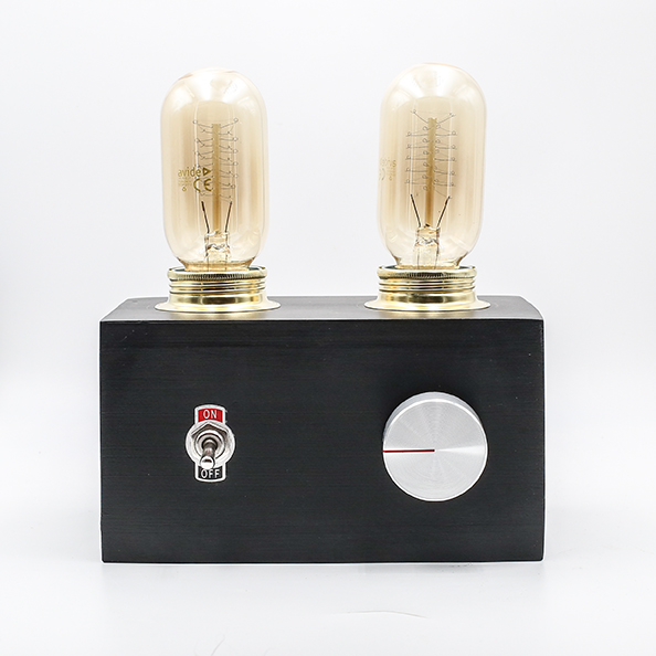 RADIO LAMP BLACK No.2 made with porcelaine clay, two bulbs and a silver dimming button.
