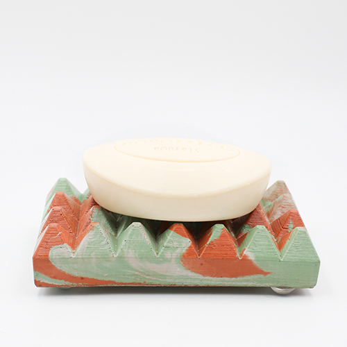 Soapdish Loupia route de Limoux marble green, orange and white color, rectangle base and triangular prisme to drain water, handmade in Berlin with porcelain clay.