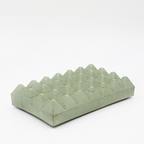 Soap dish Loupia Rue des caves green color, rectangle base and triangular prisme to drain water, handmade in Berlin with porcelain clay.