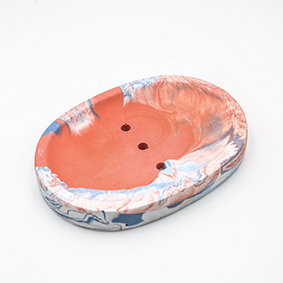 Soap dish Cannes rue de Belfort, marble terracotta, white and grey, oval shape with three draining holes, handmade in Berlin by Kula.