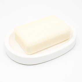 Soapdish Cannes rue du près white color, oval shape with three draining holes, handmade in Berlin by Kula.