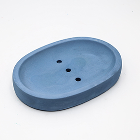 Soapdish Cannes Av de Lyon blue sky color, oval shape with two draining holes, handmade in Berlin by Kula.