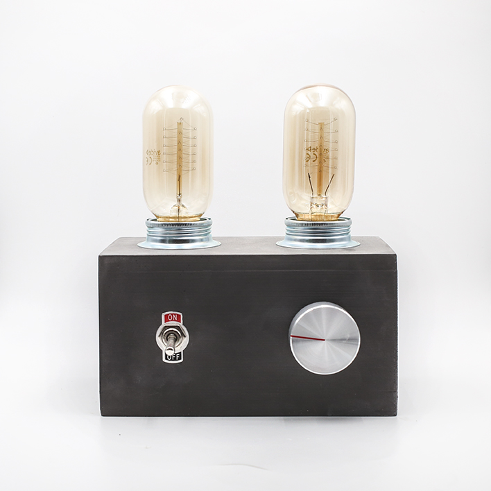 RADIO LAMP ANTHRACITE made with porcelaine clay, two bulbs and a silver dimming button.