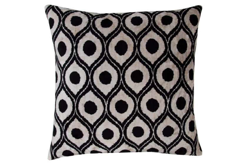 Image of a handcrafted colorful velvet silk cushion, perfect for adding a pop of color to any room. The cushion features a unique design and is made of high-quality materials, making it both beautiful and comfortable. Use this cushion to create a luxurious and stylish atmosphere in your home. Order yours today and elevate your decor with this one-of-a-kind cushion.