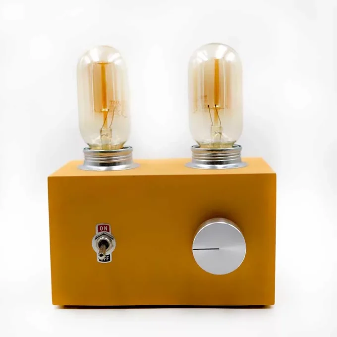 Vintage-style yellow tube amplifier lamp with Edison bulb