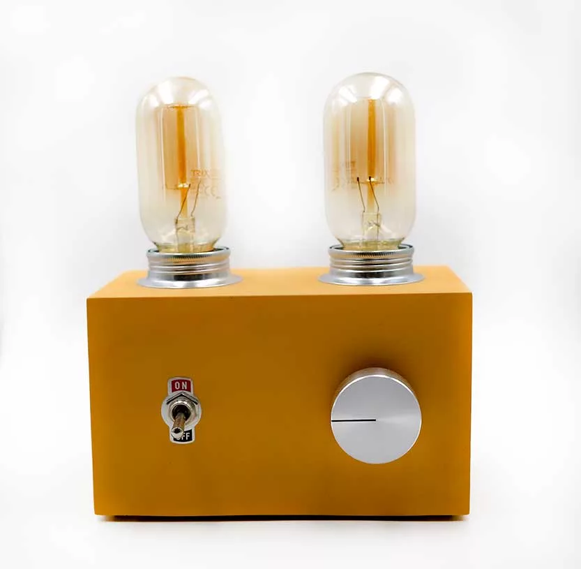 Vintage-style yellow tube amplifier lamp with Edison bulb