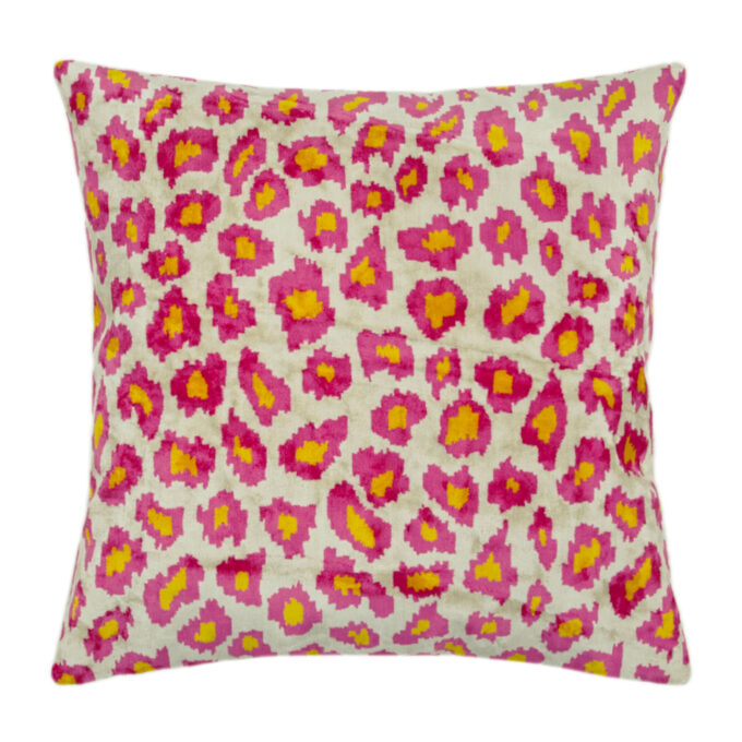 Handmade cotton ikat pillow in vibrant colors, ideal decorative accent for sofas and beds.”